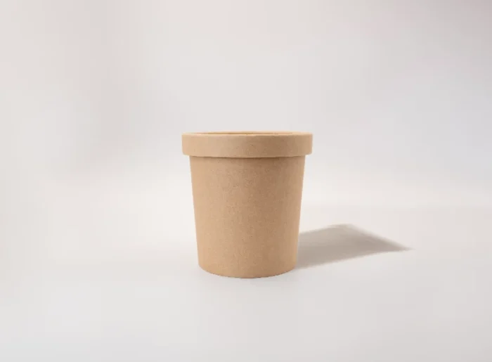 "Eco-friendly brown paper container on a white background, showcasing sustainable packaging solutions from www.jcpackagingdubai.com."