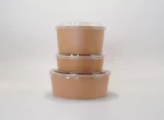 "Stack of brown paper food containers with clear lids, demonstrating JC Packaging Dubai's efficient packaging solutions at www.jcpackagingdubai.com."