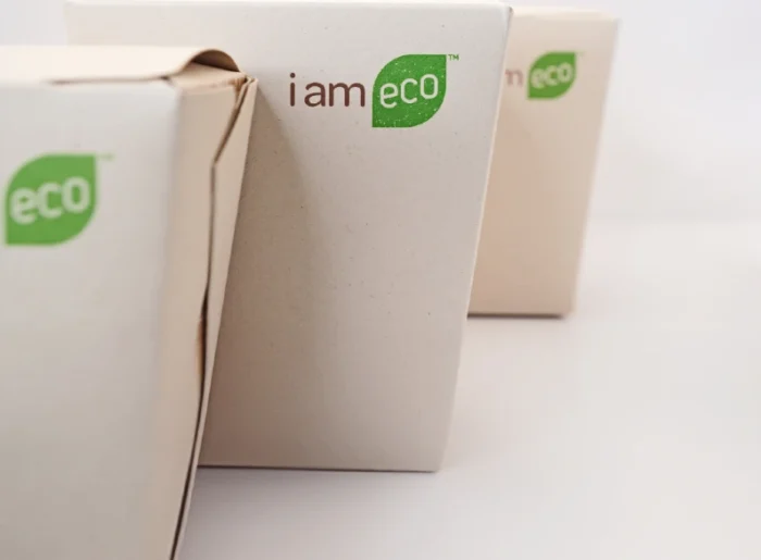 "Two biodegradable cardboard boxes with 'i am eco' branding, reflecting JC Packaging's commitment to sustainable packaging solutions."