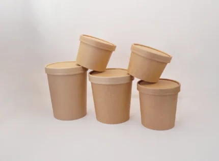 "A set of kraft paper noodle bowls with lids, highlighting JC Packaging Dubai's commitment to sustainable food packaging at www.jcpackagingdubai.com."