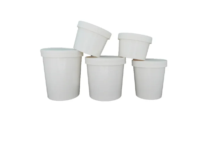 "Assorted sizes of white paper noodle bowls with matching lids, part of JC Packaging Dubai's versatile food containers at www.jcpackagingdubai.com."